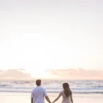 beach-couple-sunset-hand-in-hnad-romantic-moment