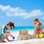 beach-kids-sandcastle-summer-time