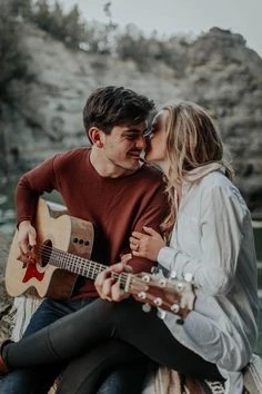 GUITAR, BOY,GIRL,MOUNTAINS,HOLIDAY