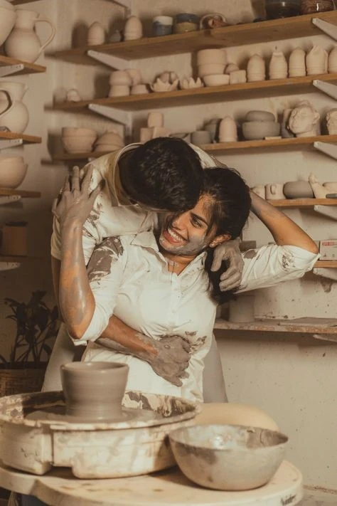 BOY GIRL POTTERY FUN LAUGHTER