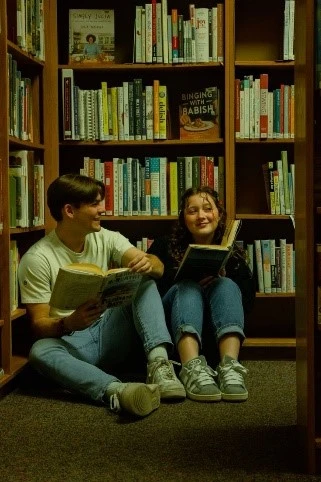 BOOKS, READING, BOY,GIRL,GIGGLES