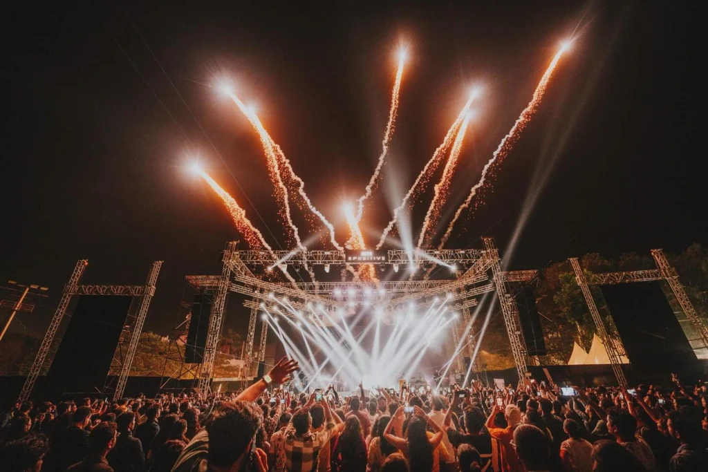 low angle,orange lights,fireworks,crowd